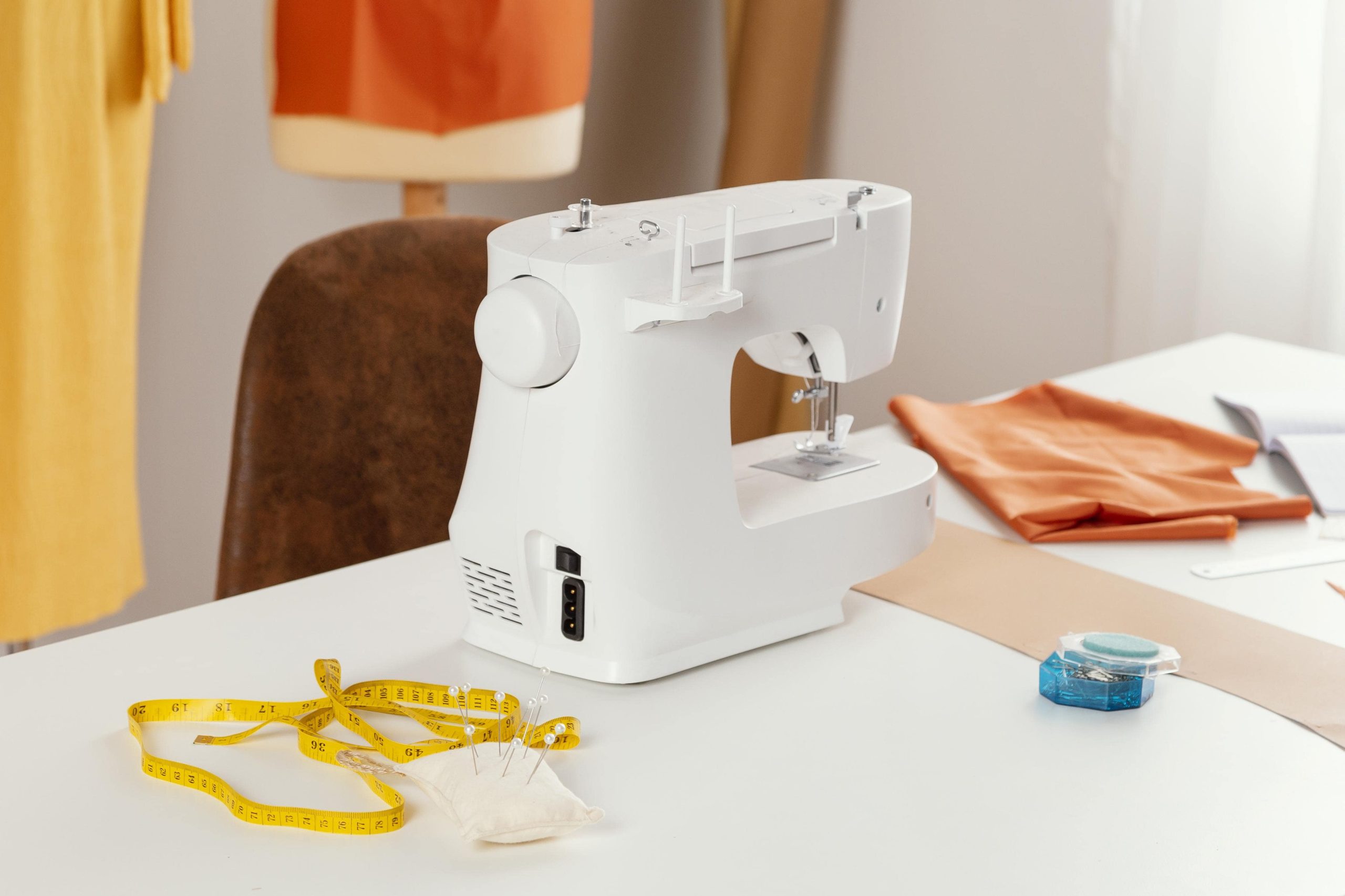 Sewing machine on workspace table - professional sewing machine repair in Tamarac FL