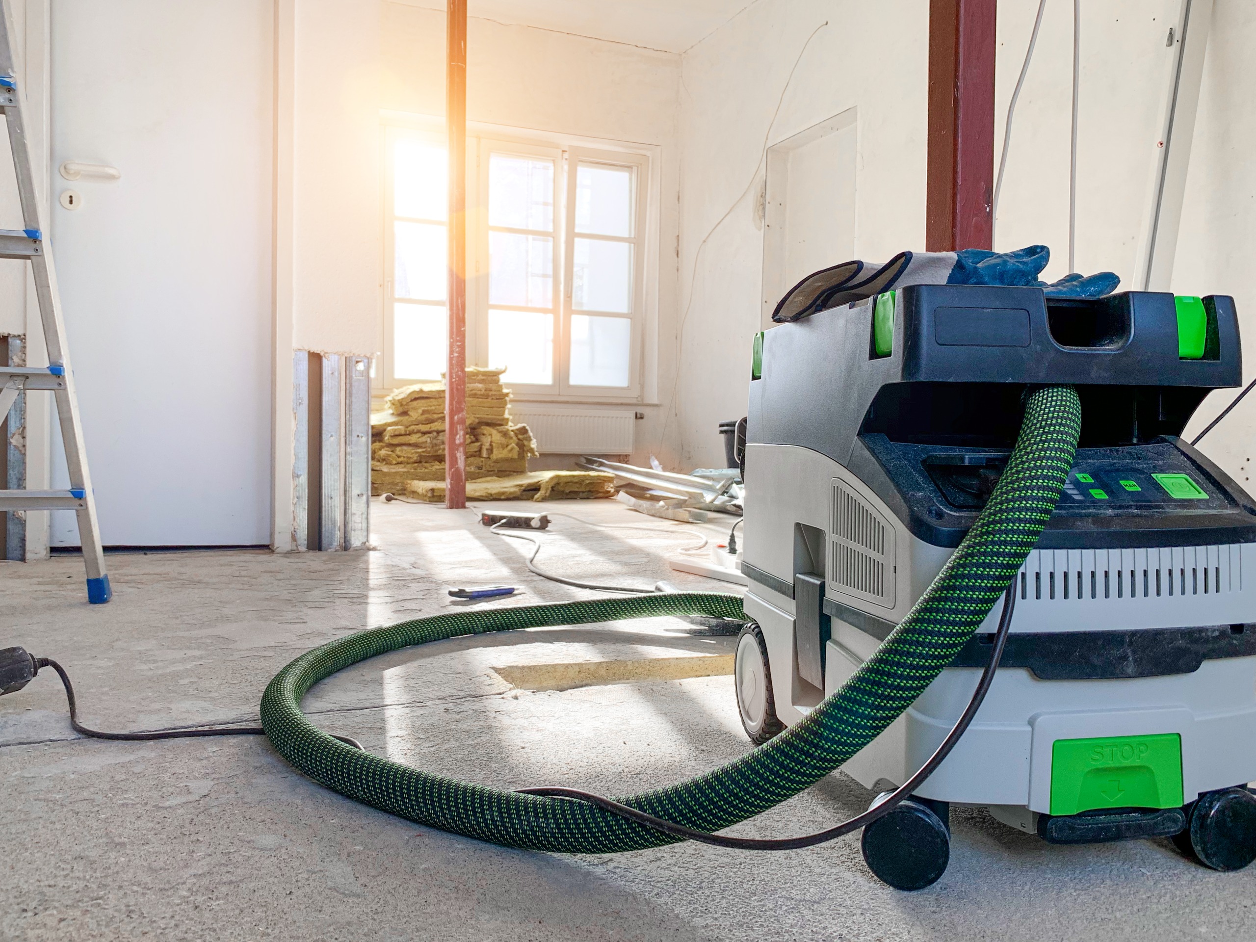 Professional central vacuum repair service in West Palm Beach - Gator Vacuum technician installing system